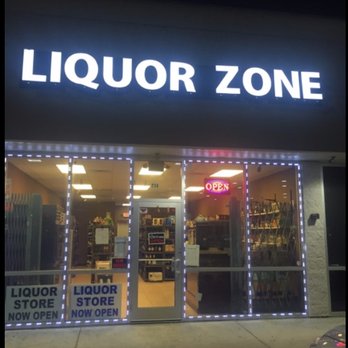 Liquor Zone - a liquor storefront at night - Tobacco Shops Near Me - Dickinson, Texas Liquor Zone - a liquor storefront at night - Tobacco Shops Near Me - Dickinson, Texas