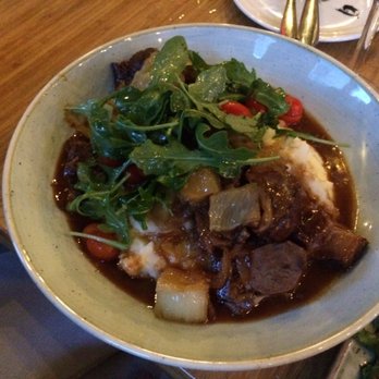 Stella's - Braised lamb neck with feta mashed potatoes. A special from June. - Greek Near Me - Charleston, South Carolina