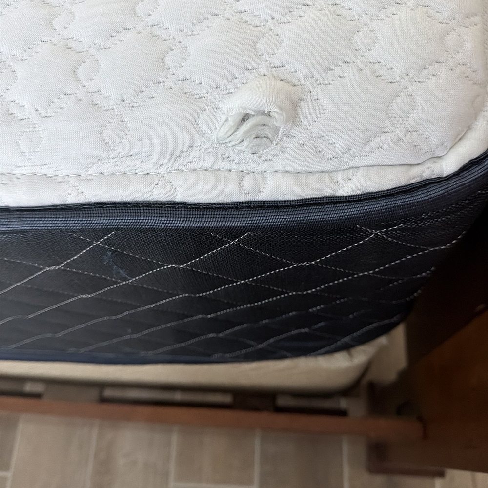 Destin Moving & Storage - Hole in mattress that the movers caused. - Movers Near Me - Santa Rosa Beach, Florida Destin Moving & Storage - Hole in mattress that the movers caused. - Movers Near Me - Santa Rosa Beach, Florida