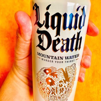 Poggie Tavern - a hand holding a can of liquid death - Bars Near Me - Seattle, Washington Poggie Tavern - a hand holding a can of liquid death - Bars Near Me - Seattle, Washington