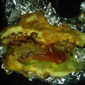 RJ's Burger Joint - a half annihilated burger (I did not do this) - Burgers Near Me - Tacoma, Washington