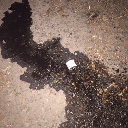 Here is a picture of what fell out from underneath my car after I got home from my oil change. There is oil everywhere now. Here is a picture of what fell out from underneath my car after I got home from my oil change. There is oil everywhere now.