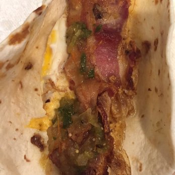 Donut 79 - Bacon and Egg taco. I like to see when egg is real! Salsa is also very good! - Donuts Near Me - Round Rock, Texas Donut 79 - Bacon and Egg taco. I like to see when egg is real! Salsa is also very good! - Donuts Near Me - Round Rock, Texas
