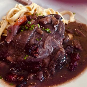 Ma Maison - Chicken Coq Au Vin with buttered noodles. - French Near Me - Boston, Massachusetts Ma Maison - Chicken Coq Au Vin with buttered noodles. - French Near Me - Boston, Massachusetts