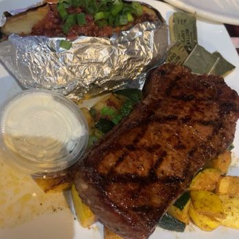 500 Club Casino - Steak dinner on a bed of zucchini and squash. Got it with a loaded baked potato. - Casinos Near Me - Clovis, California 500 Club Casino - Steak dinner on a bed of zucchini and squash. Got it with a loaded baked potato. - Casinos Near Me - Clovis, California