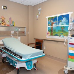 Medco ER & Urgent Care - Medco ER & Urgent Care pediatric exam room.