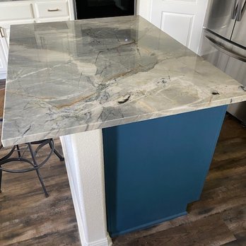 Cactus Home Improvement - a kitchen island with a marble countertop - Kitchen & Bath Near Me Cactus Home Improvement - a kitchen island with a marble countertop - Kitchen & Bath Near Me