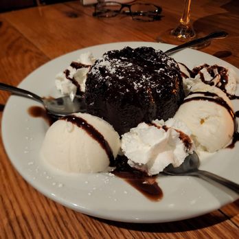 Vigneto Cafe - Double chocolate lava cake, vanilla ice cream, chocolate sauce wirh whipped cream. - Wine Bars Near Me - Highland, New York