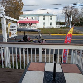 Margarita Restaurant - Outdoor table has a tiny water view! - Peruvian Near Me - Colonial Beach, Virginia Margarita Restaurant - Outdoor table has a tiny water view! - Peruvian Near Me - Colonial Beach, Virginia