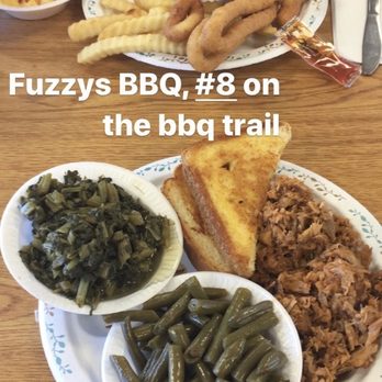 Fuzzy's Wholesale Bar-B-Que - Barbecue, green beans, collards, and Texas toast. Note the long hush puppies at the top - Barbeque Near Me - Madison, North Carolina