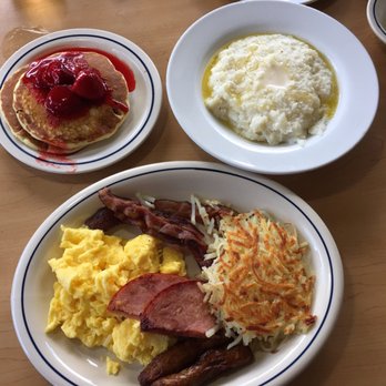 IHOP - Breakfast Sampler with strawberry pancakes and grits... - American Near Me - PEMBROKE PINES, Florida IHOP - Breakfast Sampler with strawberry pancakes and grits... - American Near Me - PEMBROKE PINES, Florida