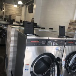 Happy Laundry - Brand New washers accept all credit card and debit cards.
