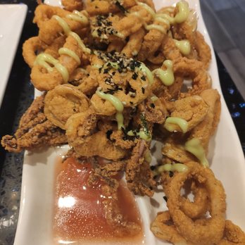 Poor Calvin's - Calamari - Asian Fusion Near Me - Atlanta, Georgia Poor Calvin's - Calamari - Asian Fusion Near Me - Atlanta, Georgia