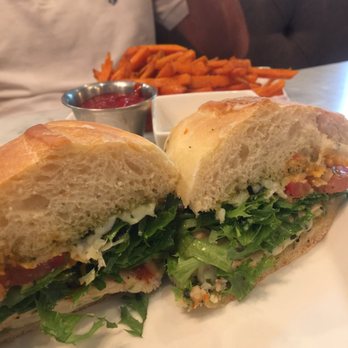 J Theodore - Grilled chicken pesto sandwich with sweet potato fries - New American Near Me - Frisco, Texas J Theodore - Grilled chicken pesto sandwich with sweet potato fries - New American Near Me - Frisco, Texas