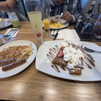 Broken Yolk Cafe - Nutella Crepes with bananas and strawberries. Added hashed browns and sausages. Nutella Crepes - American Near Me - Glendora, California Broken Yolk Cafe - Nutella Crepes with bananas and strawberries. Added hashed browns and sausages. Nutella Crepes - American Near Me - Glendora, California