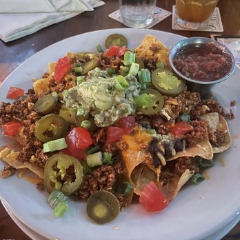 The Top - Nachos with vegan crumbles. They were okay. Really nothing wrong with them but also nothing spectacular. - New American Near Me - Gainesville, Florida The Top - Nachos with vegan crumbles. They were okay. Really nothing wrong with them but also nothing spectacular. - New American Near Me - Gainesville, Florida