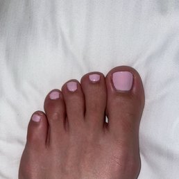 Bad polish job. Polish not covering all of the nail. $50 gel pedi