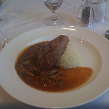 Courses - a plate of food on a table - New American Near Me - Muskegon, Michigan