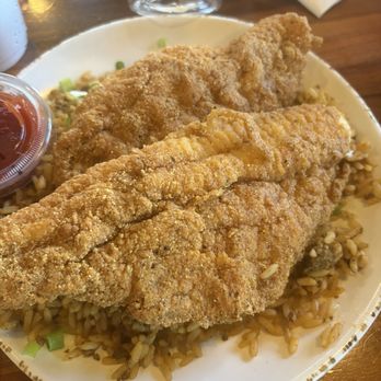 Orleans Seafood Kitchen - Catfish with dirty rice - Cajun/Creole Near Me - Katy, Texas