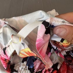 Reve Boutique - Item I received "new" with a ripped hem