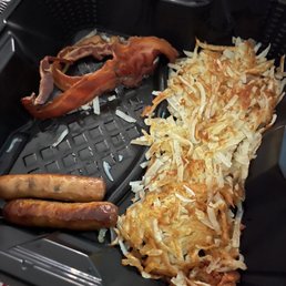 bacon, hash browns, and sausages in a container