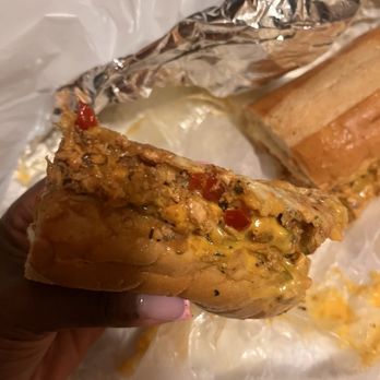 Papis Cheese Steaks And More - My sexy salmon chopped cheese...so good. - Cheesesteaks Near Me - New York, New York