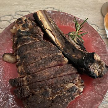 Knife & Spoon - The 44 farms dry aged bone-in ribeye - Seafood Near Me - Orlando, Florida Knife & Spoon - The 44 farms dry aged bone-in ribeye - Seafood Near Me - Orlando, Florida
