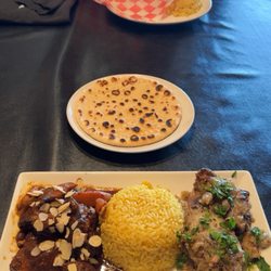 Moroccan chicken / champagne chicken plate with saffron rice (bottom)