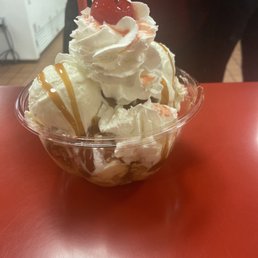 VIP Special, featuring cheesecake ice cream, pound cake, caramel drizzle and whipped cream.