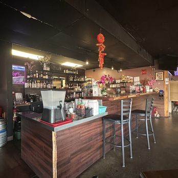 VN Fusion Bar N Grill - Bar area & 3-4 dining(4 seater) tables against the window wall to the right - Vietnamese Near Me - Gresham, Oregon VN Fusion Bar N Grill - Bar area & 3-4 dining(4 seater) tables against the window wall to the right - Vietnamese Near Me - Gresham, Oregon