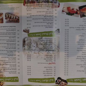 JU-Sushi - a menu for a sushi restaurant - A menu page from a sushi restaurant shows sections for Nigiri Sushi, Sashimi, and Poke Bowls, with prices and descriptions for each item. The menu includes images of sushi rolls and sashimi at the top. The layout is colorful with green headers and a mix of text and images, providing options for dine-in or take-out. - Japanese Near Me - Groton, Connecticut