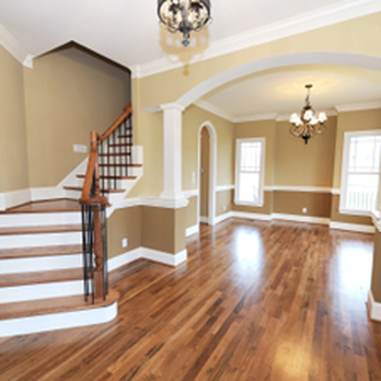 The Floor Man - an empty living room and staircase - Flooring Near Me - Southlake, Texas The Floor Man - an empty living room and staircase - Flooring Near Me - Southlake, Texas