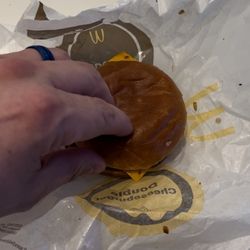 McDonald's - Burned burger looks like it was picked up from the floor