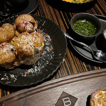 Jack Binion's Steak at Horseshoe Las Vegas - Smashed potatoes with side sauces - Steakhouses Near Me - Las Vegas, Nevada Jack Binion's Steak at Horseshoe Las Vegas - Smashed potatoes with side sauces - Steakhouses Near Me - Las Vegas, Nevada