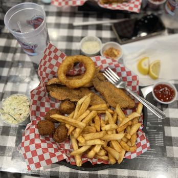 Collierville Commissary - Catfish plate included three pieces of fried catfish with fries, hush puppies, slaw, tartar sauce, and ketchup. - Barbeque Near Me - Collierville, Tennessee Collierville Commissary - Catfish plate included three pieces of fried catfish with fries, hush puppies, slaw, tartar sauce, and ketchup. - Barbeque Near Me - Collierville, Tennessee