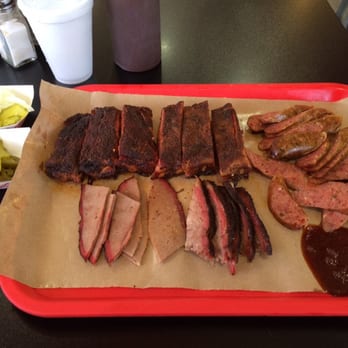 It's Ribs! - Half a rack of Pork Ribs, Half a Pound of jalapeño sausage and a Mixed Qauter Pound of Brisket (lean & moist) $24. - Barbeque Near Me - Houston, Texas