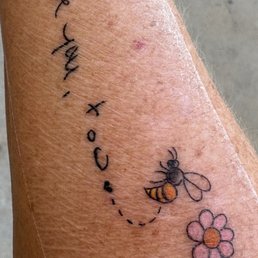 This is in my mom's handwriting and the bee represents my dad who passed away.  I love it so much.