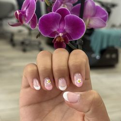 Luxora Nails Spa - Pink and White French Tip Nails with flower