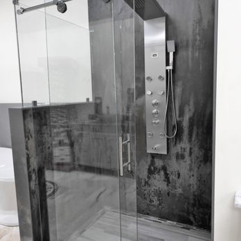 USA Cabinet Store - a shower with a glass door - Kitchen & Bath Near Me - Conroe, Texas USA Cabinet Store - a shower with a glass door - Kitchen & Bath Near Me - Conroe, Texas