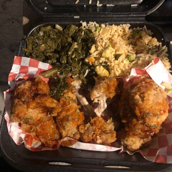 Chicken’s Kitchen - Started eating before the picture sweet and spicy wings with shrimp fried rice and greens - Soul Food Near Me - Harvey, Louisiana