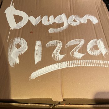 Dragon Pizza - Inside out box leaving black ink all over the top of the pizza. - Pizza Near Me - Somerville, Massachusetts Dragon Pizza - Inside out box leaving black ink all over the top of the pizza. - Pizza Near Me - Somerville, Massachusetts