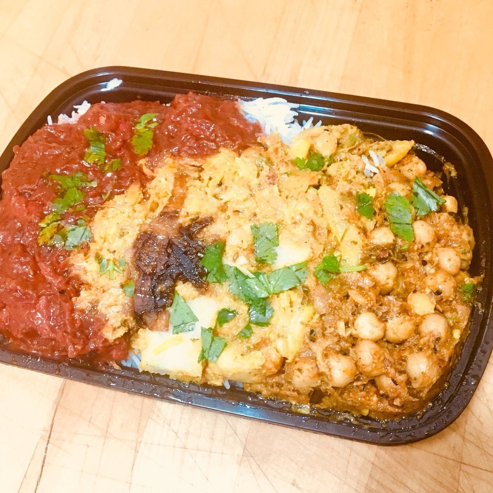 King Place - a tray of food on a table - Pakistani Near Me - Toronto, Ontario