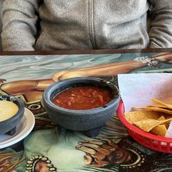 Cheese dip, salsa and chips