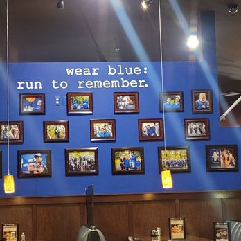 McNamara's Pub & Eatery - a blue wall with pictures on it - Irish Near Me - DuPont, Washington