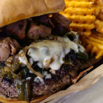 The Git Out - Texas Burger. Dry, weird brisket chunks, but good otherwise. Ordered with waffle fries (+$3.50). - Bars Near Me - Austin, Texas The Git Out - Texas Burger. Dry, weird brisket chunks, but good otherwise. Ordered with waffle fries (+$3.50). - Bars Near Me - Austin, Texas