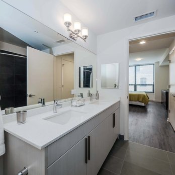 Chateau on Wells Apartments - apt 603 primary bedroom/bathroom - Apartments Near Me - Chicago, Illinois Chateau on Wells Apartments - apt 603 primary bedroom/bathroom - Apartments Near Me - Chicago, Illinois