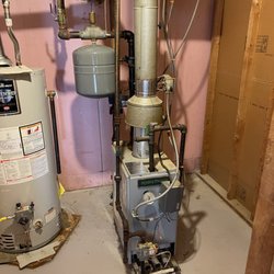 DM HVAC & Maintenance Services - Removing an old boiler from 1987 and replacing with a brand new tankless Navien boiler/water heater combo