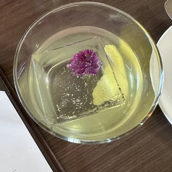 Solbar - Clarified Rum Punch - there are flowers frozen in the giant ice cube! - New American Near Me - Calistoga, California Solbar - Clarified Rum Punch - there are flowers frozen in the giant ice cube! - New American Near Me - Calistoga, California