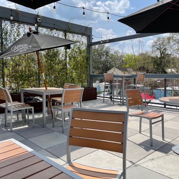 Starland Yard - tables and chairs with umbrellas - Food Trucks Near Me - Savannah, Georgia Starland Yard - tables and chairs with umbrellas - Food Trucks Near Me - Savannah, Georgia