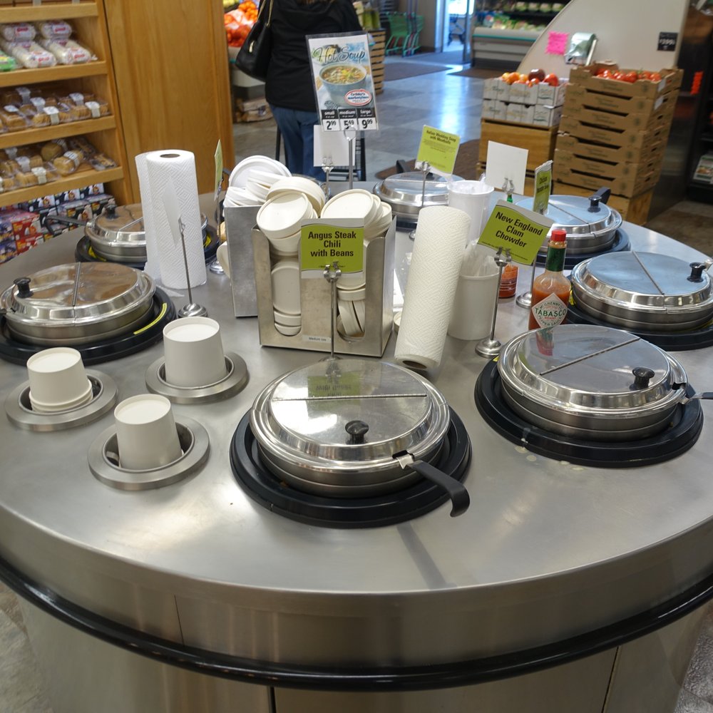 Crosbys Marketplace - a counter with pots and pans on it - Grocery Near Me - Georgetown, Massachusetts